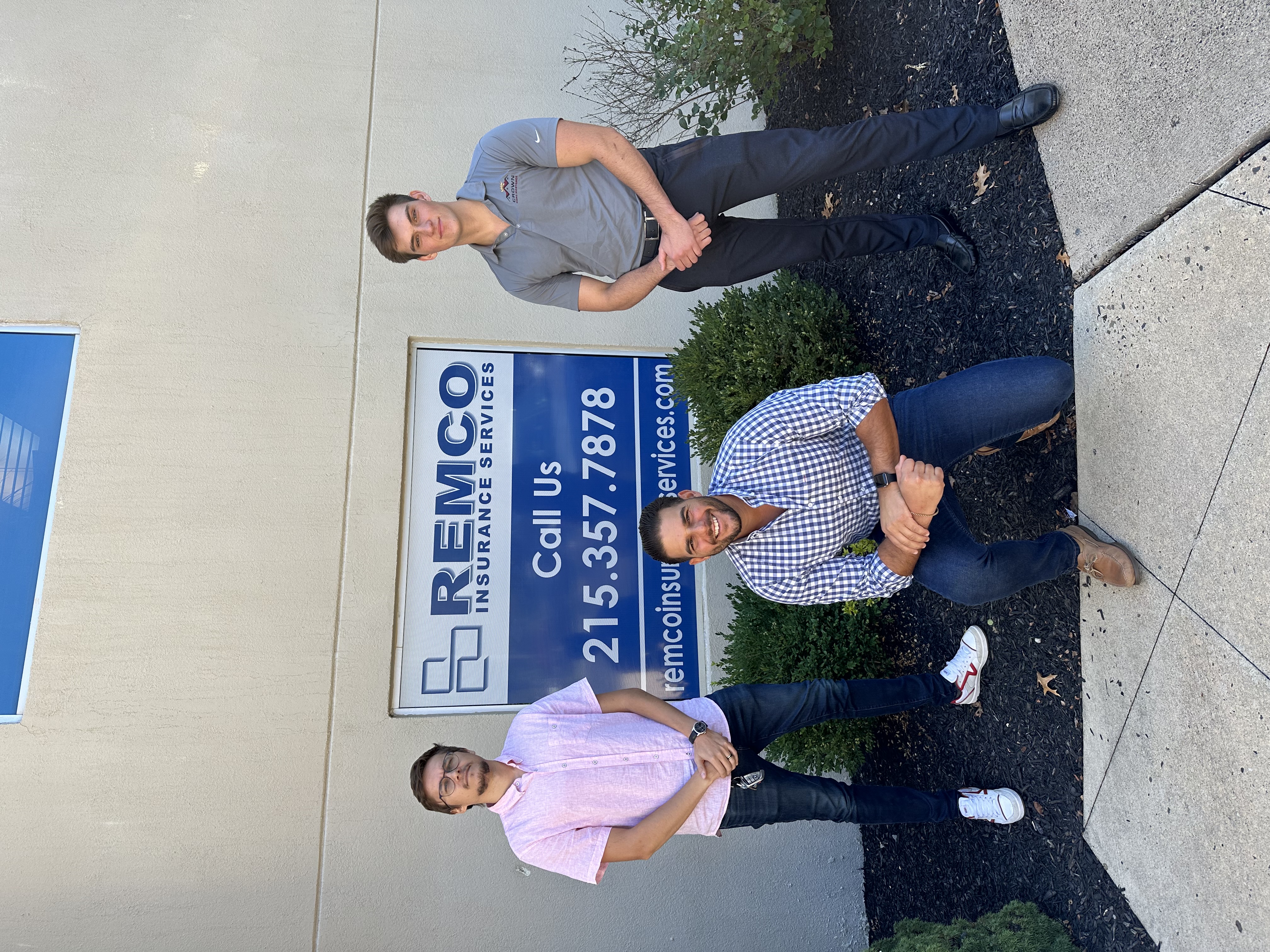 Remco team in front of the Southampton office sign